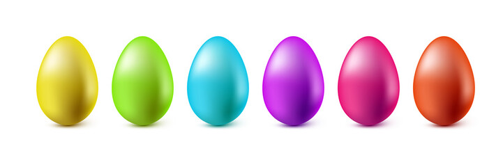 Color Easter eggs stand in a row on a white background.