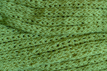 Green knitting wool texture background