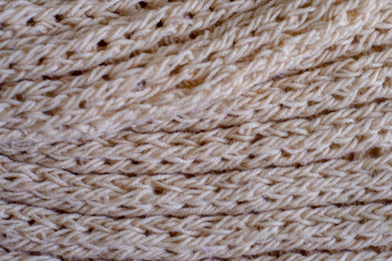 Beige knitting wool texture background