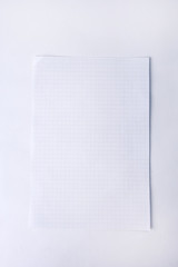 close up.a sheet of notebook and paper clip .photo with copy space.background.