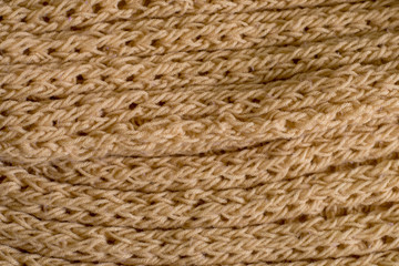 Beige knitting wool texture background