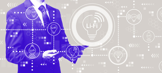 LiFi theme with businessman holding a tablet computer