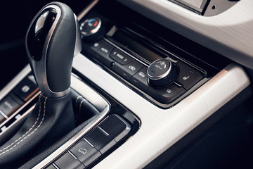 Selector automatic transmission with perforated leather in the interior of a modern expensive car....