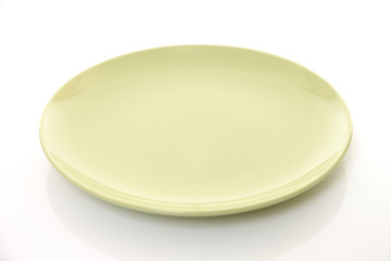 empty green dish on the white table