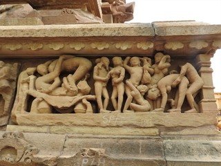 Fototapeta na wymiar The Western group of Khajuraho temples, a UNESCO heritage site, is famous for its erotic sculptures, India, clear day.