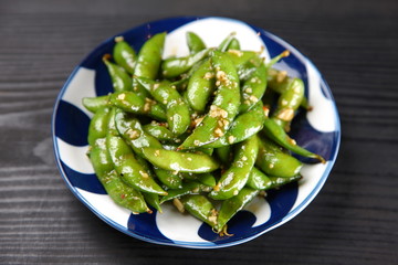 Stir-fried green soy beans seasoned garlic