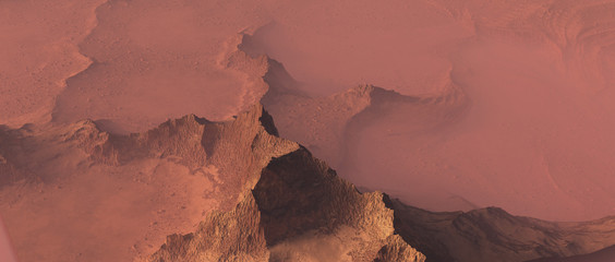 Sharp orange colored ridges in mist. Aerial view.