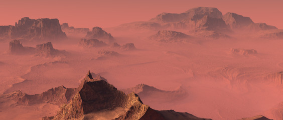 Sharp orange colored ridges in mist. Aerial view.