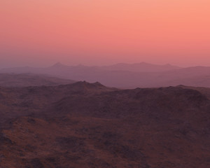 Mountains in foggy sunrise.