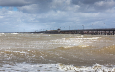 Ryde beach and pier at high tide in strong winds