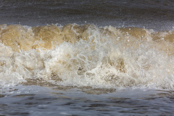 Ryde beach and pier at high tide in strong winds
