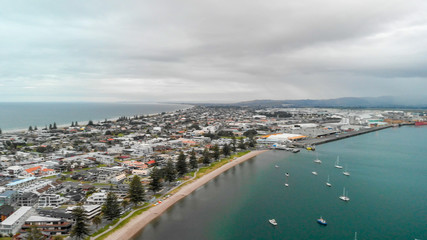 Fototapeta premium Aerial view of Mt Maunganui on a cloudy winter day, New Zealand
