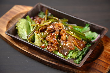 stir-fried beef and buds of garlic