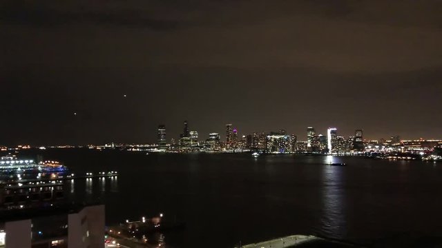 Midtown Manhattan and Jersey City night panorama, view from a west side rooftop