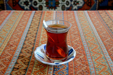 a cup of Turkish tea on the table