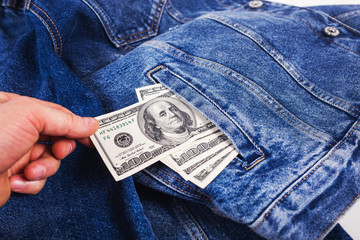 dollars in jeans pocket