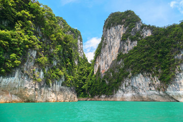 Fototapeta premium Beautiful landscape of Khao sok national park with long tail boat at suratthani,Thailand