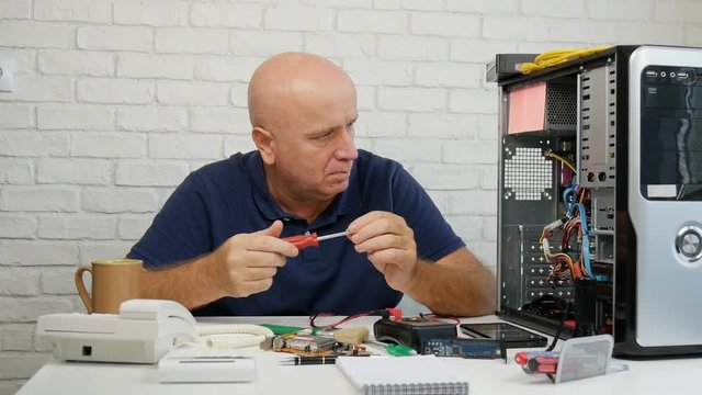 Slow Motion with Busy Engineer Fixing Hardware Problems in a Computer Service
