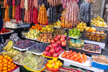 Georgia, the local bazaar. Sale of national sweets from grapes and nuts - 