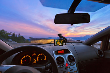 Car interior and mountains road in Kotor Montenegro