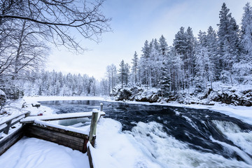 The river in winter season at Oulanka National Park, Finland.