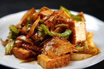 Stir-fried pork and thick fried tofu