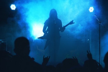 Fototapeta na wymiar Performance of rock of group on a scene.