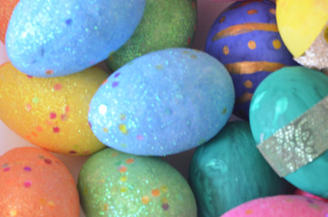 Colorful bright easter egg background, multi-colored balls. out of focus, blurry