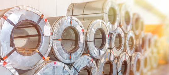 Industrial warehouse with rolls of steel sheet in a plant galvanized steel coil
