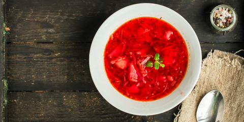 red tomato soup with vegetables (vegetarian food without meat) first course. top.  food background. copy space