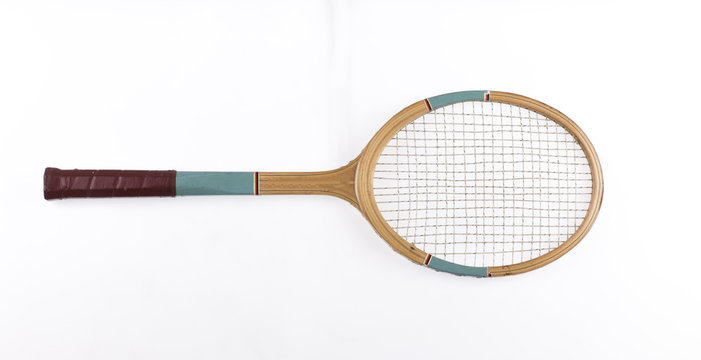 vintage wooden tennis racket on a white background