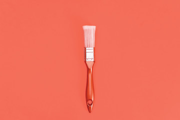Coral brush on a coral background