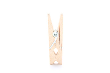 Wooden clothespin isolated on white background