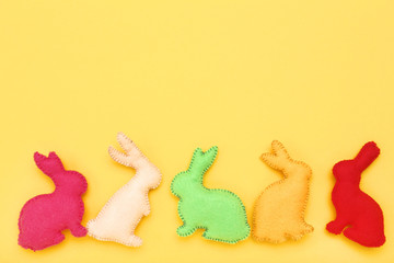 Easter fabric rabbits on yellow background