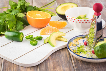 Ingredients for orange avocado salsa.