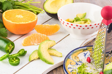 Ingredients for orange avocado salsa.