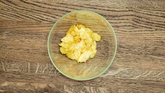 Time lapse. Crispy potato chips. Quantity reduction.