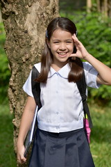 Thoughtful Young Asian Female Student Wearing School Uniform