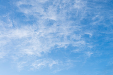 Blue sky and white fluffy tiny clouds background and pattern
