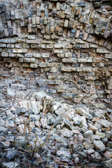 Old abandoned wall with bricked up windows