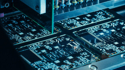 Factory Machine at Work: Electronic PCB Being Assembled with Automated CNC Robotic Arm, SMT...