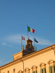 Italian flags with the symbol of Republic over the Palazzo del Q