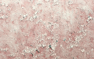 Old wooden background with remains of pieces of scraps of old paint on wood. Texture of an old tree, board with paint, vintage background peeling paint. 