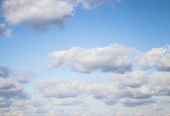Obraz premium White air clouds in the blue sky.