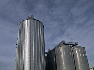 silos and blue sky,industry, silo, storage, tank, factory, sky, metal, industrial, plant, grain, steel, agriculture,cylinder