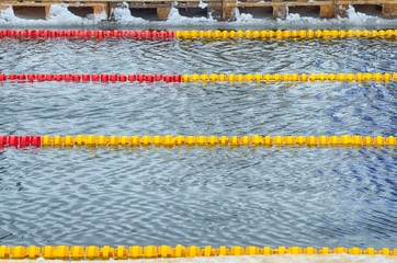 Lovers of winter swimming.Swimmer swims in the pool.
