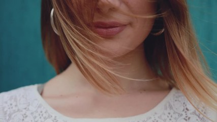 Closeup portrait of wind blows beautiful woman hair