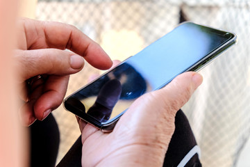 Old woman and smartphone