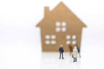 Miniature people: Business consultants on financial transactions for home loan . Image use for financial, business concept.