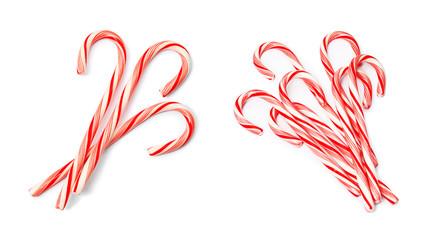 Set of tasty Christmas candy canes on white background